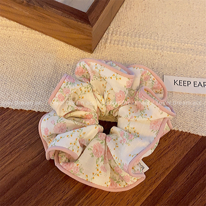 Wholesale of Colored Bear Floral Fabrics Hair Scrunchies